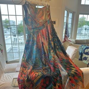 Vibrant one shoulder multi color dress featuring peacocks & flowers.